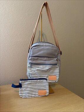 Gray Canvas Crossbody Bag with Striped Front Pocket and Tan Strap